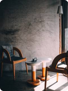 Ceramics studio workbench with tools and glazed pieces